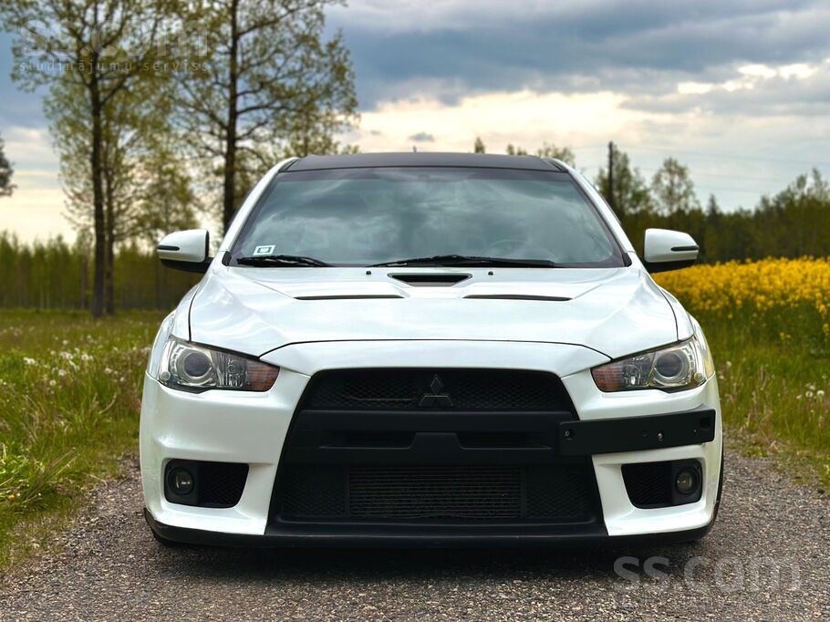 Pārdodu Mitsubishi Lancer Evolution X, 2011. gada. Mašīna ir importēta no Us
