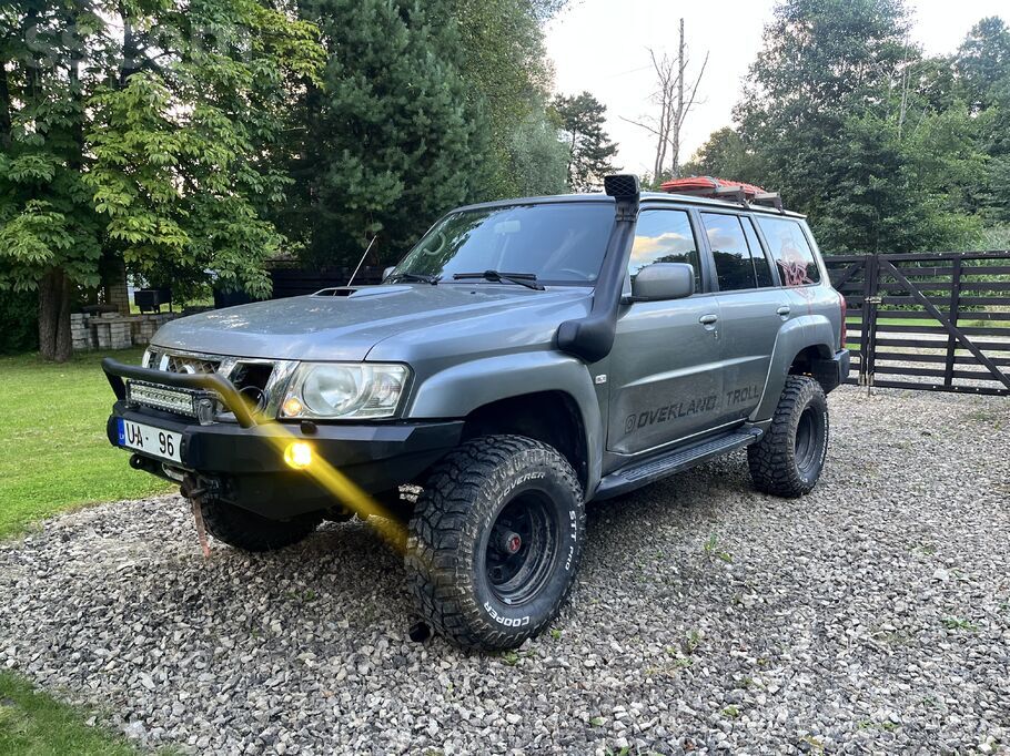 Nissan Nissan Patrol Y61, 3 collu lifts ar Ome amortizato