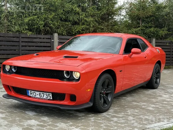 Dodge Tiek pārdots Dodge Challenger GO Mango krāsā. Auto