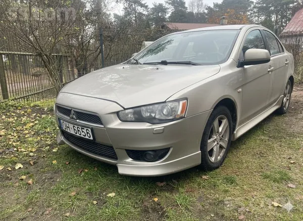 Mitsubishi Lancer 1.8L benzīna dzinējs ar automātisko pārnesumkārbu. 105Kw/1