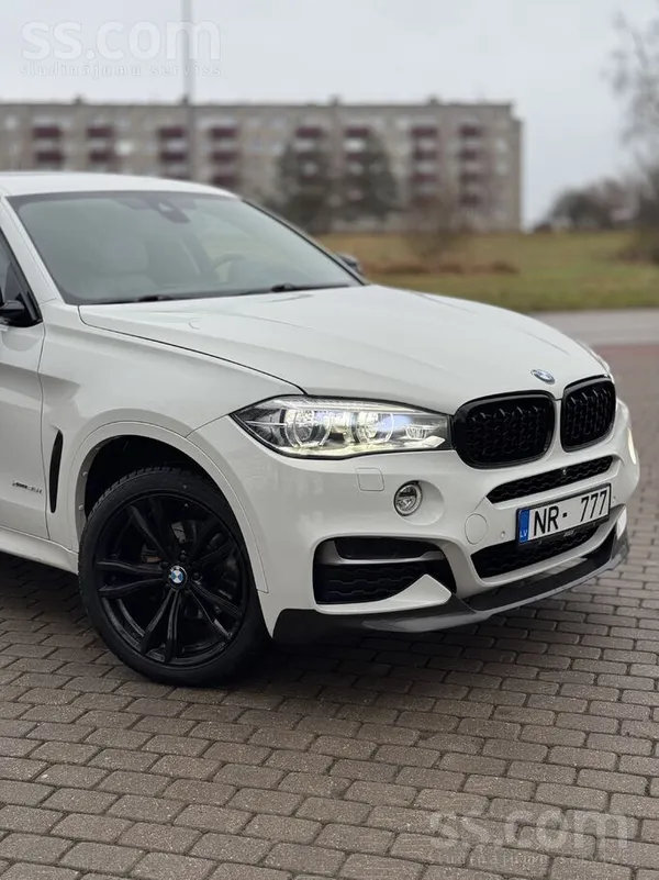 BMW Mainu pret Elekrtoauto vai retro auto