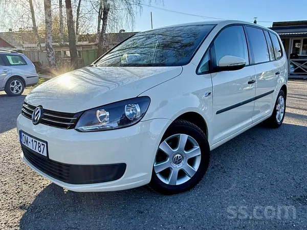Volkswagen Touran 1.6 Tdi 77 kW (105 Zs)

Только из Германии. 

Только з