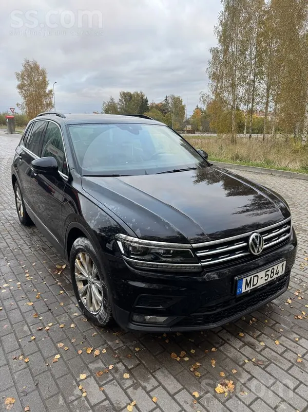 Volkswagen Pārdod melnu W Tiagun auto, Confortline, pirkta La