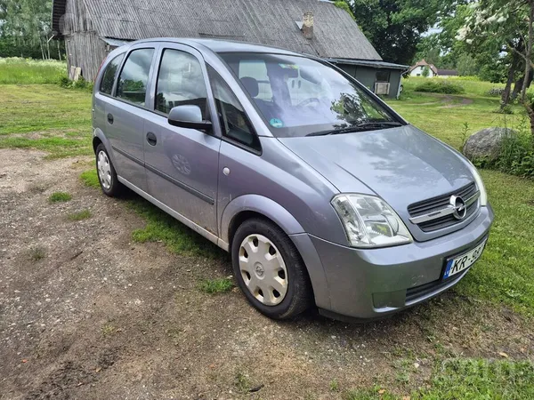 Opel Pārdod labu Opel Meriva ar sarkanu ādas salonu. Ko
