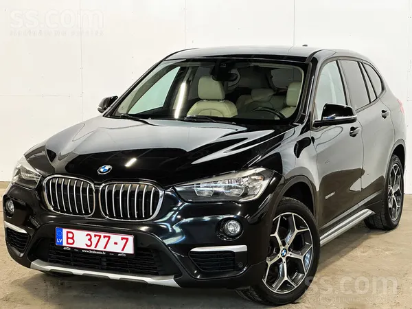 BMW Black-sapphire metallic/Model X Line. 