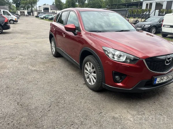 Mazda Авто в нормальном состоянии. При прогретом двигате